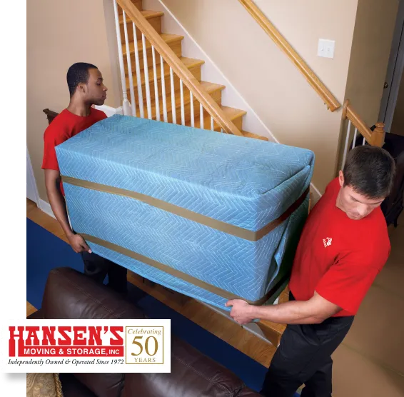 img_how_1920.png Two people carrying a mattress up a staircase